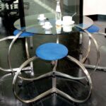 TAVOLINO CON PIANO IN VETRO BASSO ACCIAIO INOX