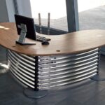 SCRIVANIA “BOOMERANG”  IN ACCIAIO INOX CON PIANALE MAXI