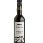 Bottiglia di Marsala Fine I.P. DOP Alagna, vino liquoroso secco siciliano dal colore ambra carico e sapore persistente.