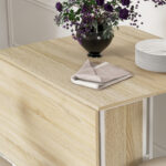 Tavolo da Pranzo Pieghevole per 6 Persone max con Ripiano, in Legno e Metallo, 130x80x74 cm, Bianco e color Legno - immagine 9